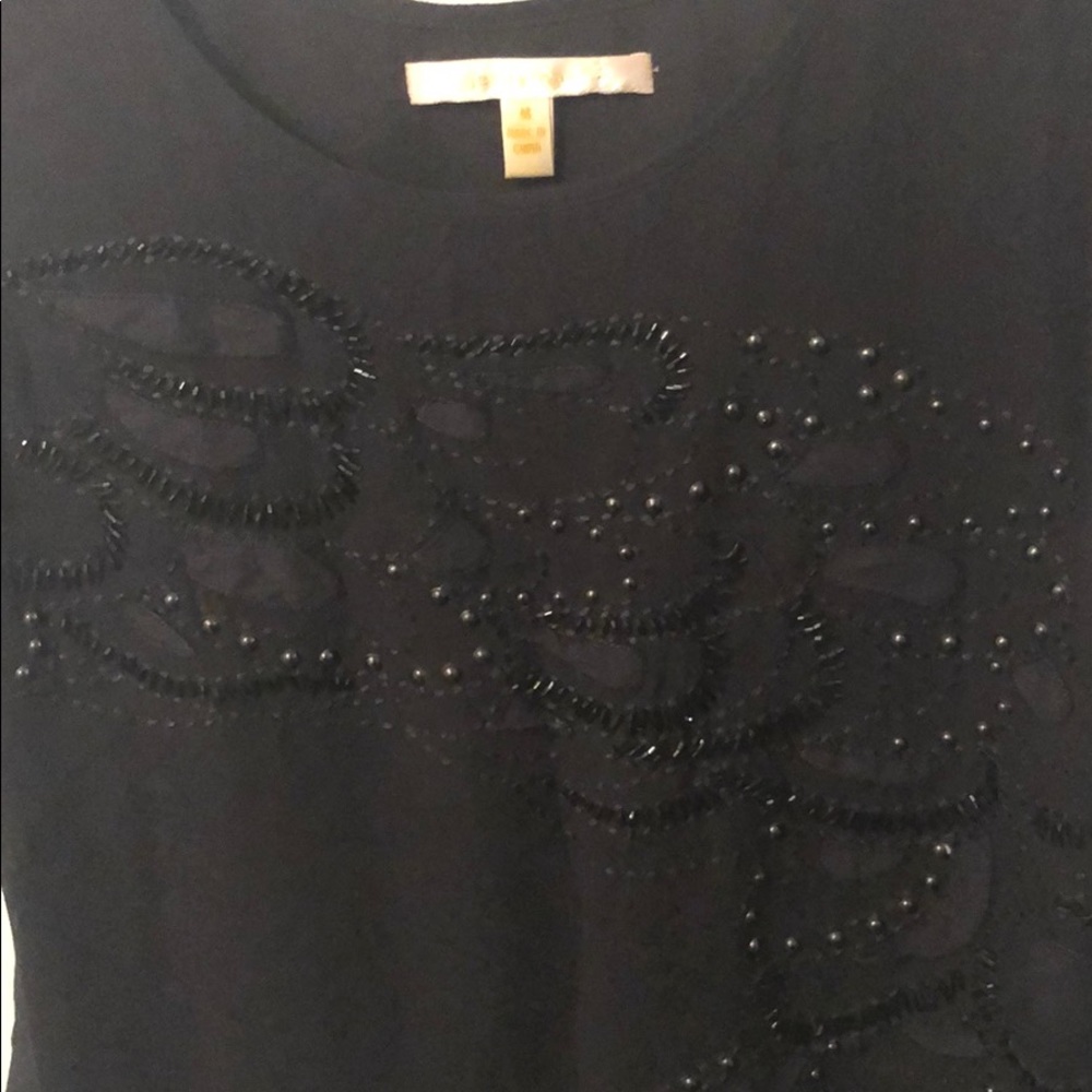 Jenny Han black tank